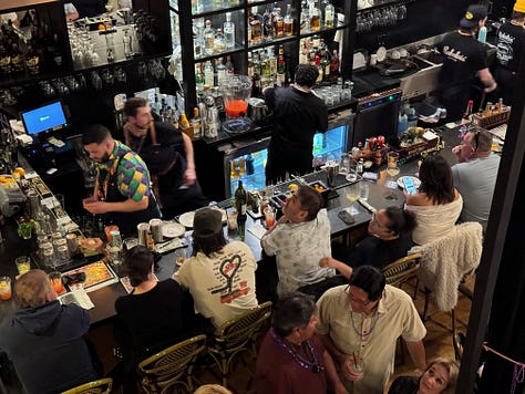 Various images of Mardis Gras at Rabalais' Bistro.