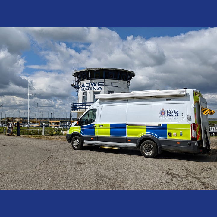 A 1960s camper van striped out filled with a winch and other equipment, a land rover defender in Essex Police livery and the modern marine unit long van with attached awning.