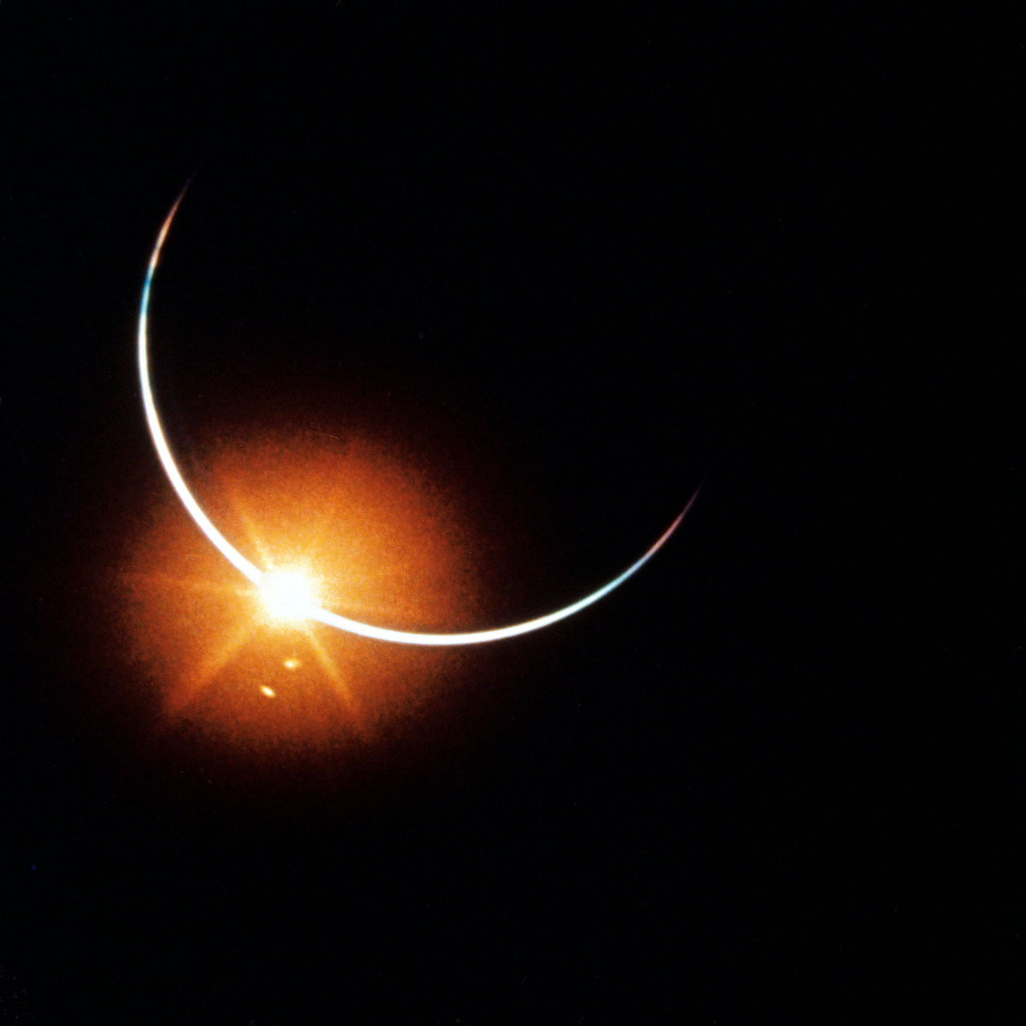 crescent earth and lens flare from bright point of sun peeking over the horizon crescent earth and lens flare from bright point of sun peeking over the horizon