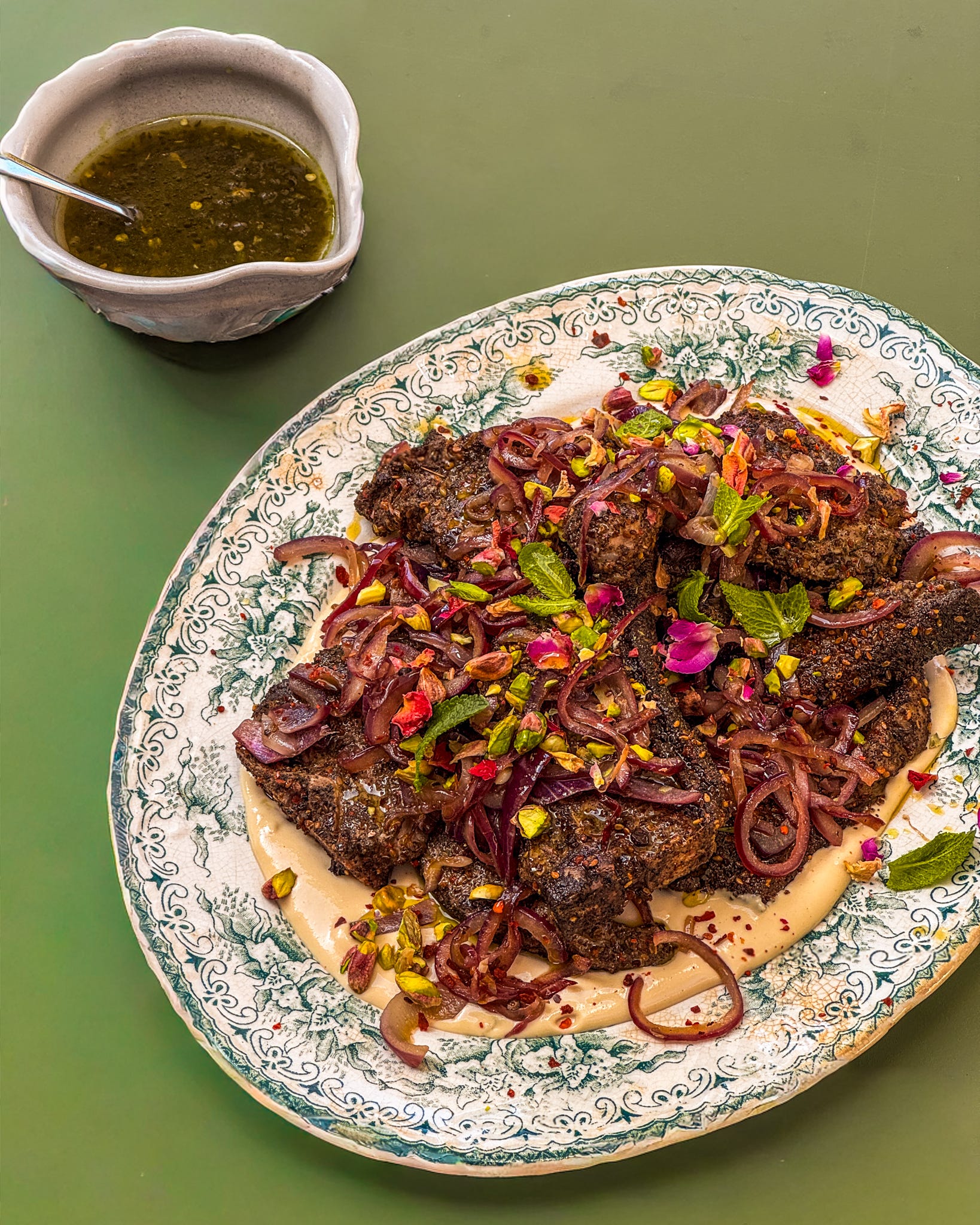 LAMB CHOPS WITH ZA'ATAR, PISTACHIOS AND TAHINI