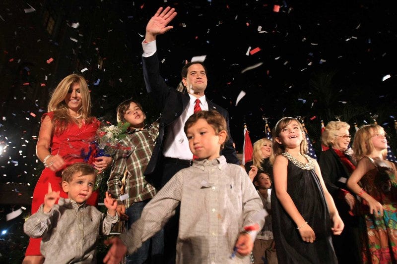Then-Florida Republican U.S. Senate nominee Marco Rubio celebrates his election victory with his family on November 2, 2010, in Coral Gables, Florida. Then-Florida Republican U.S. Senate nominee Marco Rubio celebrates his election victory with his family on November 2, 2010, in Coral Gables, Florida.