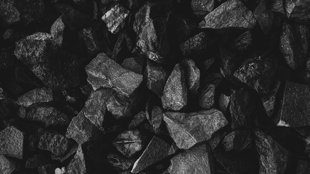 grayscale photo of stone