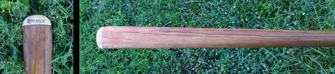 close up of the blade of a Greenland paddle, including one side with the trip logo close up of the blade of a Greenland paddle, including one side with the trip logo
