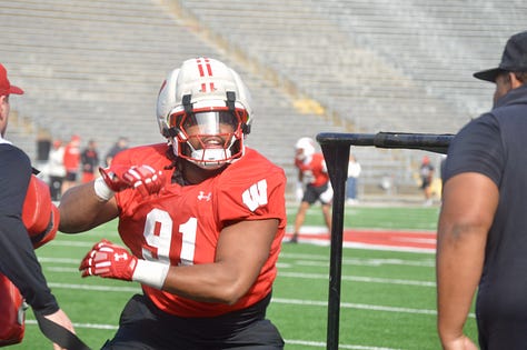 Wisconsin defensive linemen participate in individual position drills during Saturday's spring practice inside Camp Randall Stadium.