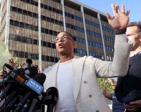 Man in front of reporter