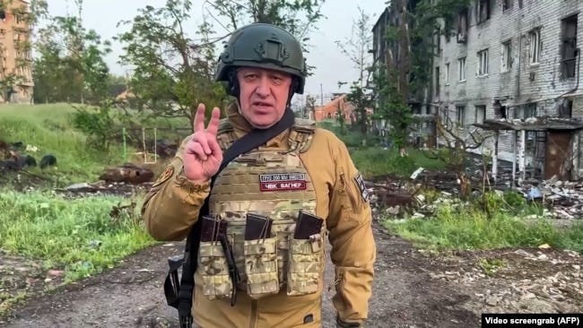 FILE - This video grab taken from handout footage posted on May 25, 2023, on the Telegram account of the press service of Concord -- a company linked Russian mercenary group Wagner head Yevgeny Prigozhin -- shows Prigozhin speaking in Bakhmut. FILE - This video grab taken from handout footage posted on May 25, 2023, on the Telegram account of the press service of Concord -- a company linked Russian mercenary group Wagner head Yevgeny Prigozhin -- shows Prigozhin speaking in Bakhmut.