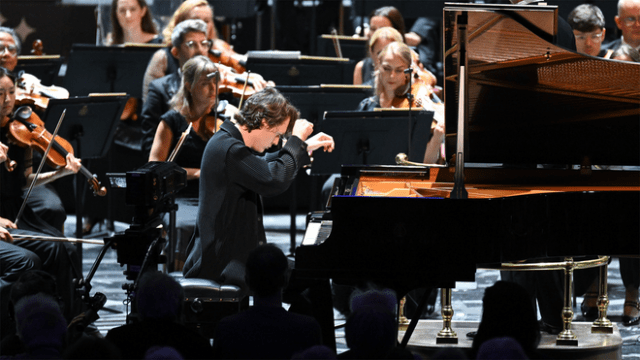 An immersive presentation featuring the BBC Symphony Orchestra and pianist Lukas Sternath performing Edvard Grieg’s Piano Concerto in A minor will be available on Apple Vision Pro this fall. Photo by BBC / Chris Christodoulou.