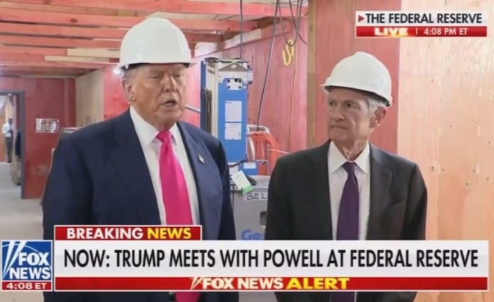 Donald Trump and Jerome Powell, both wearing white hardhats and business suits, stand in a hallway at the Federal Reserve. The building's walls are covered in plywood, with exposed wooden beams above. Donald Trump and Jerome Powell, both wearing white hardhats and business suits, stand in a hallway at the Federal Reserve. The building's walls are covered in plywood, with exposed wooden beams above.