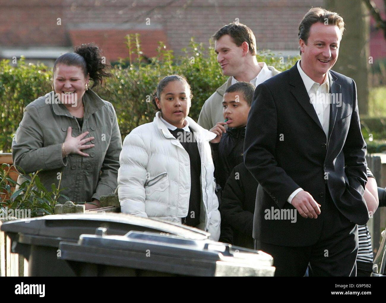 Leader of the Conservative Party David Cameron (right) meets residents of  the Benchill area of Wythenshawe during his visit to Manchester Stock Photo  - Alamy
