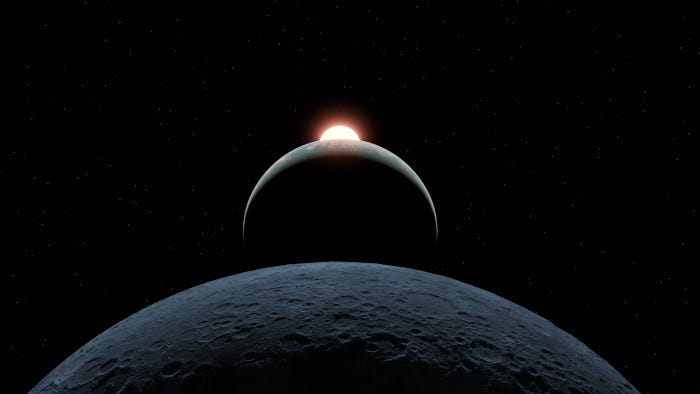 A grand, symmetrical picture with a pockmarked moon in the foreground; behind this, a planet, and behind that, the Sun just rising over the brow of the planet.