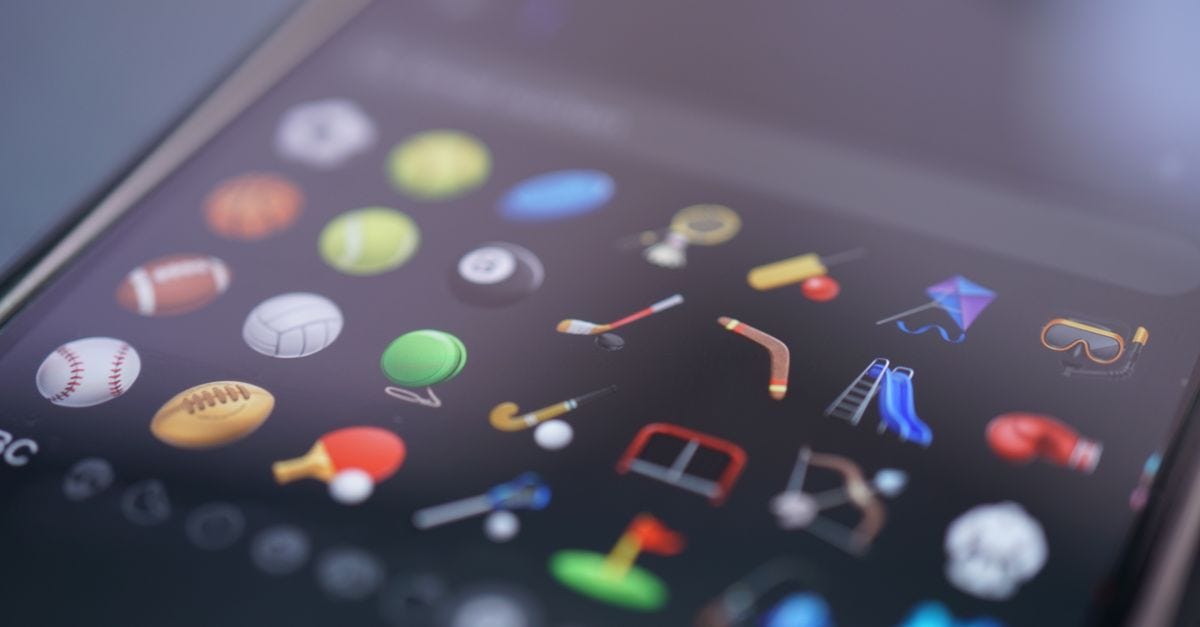 Photo: Tim Witzdam / Pexels A detailed view of various sports-themed emojis displayed on a smartphone screen.