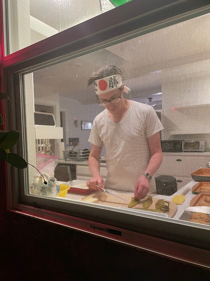 Dustin preparing his famous chili rellenos