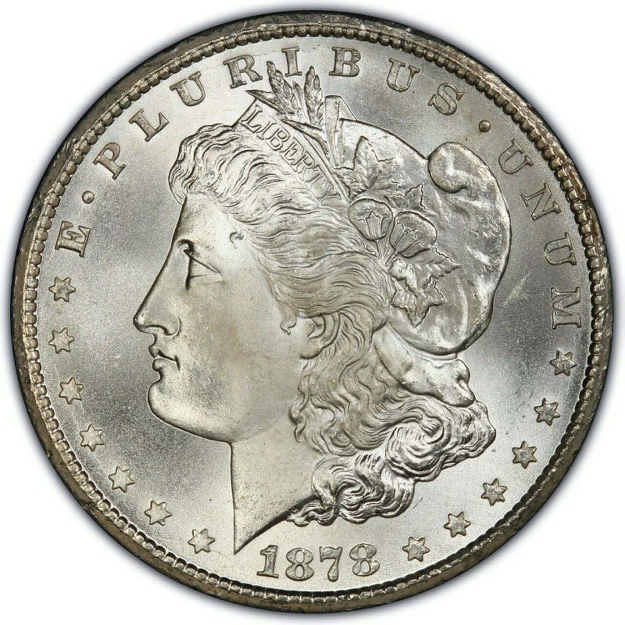 1878 Morgan Silver Dollar First Year of Issue (XF to AU) - International Currency, LLC