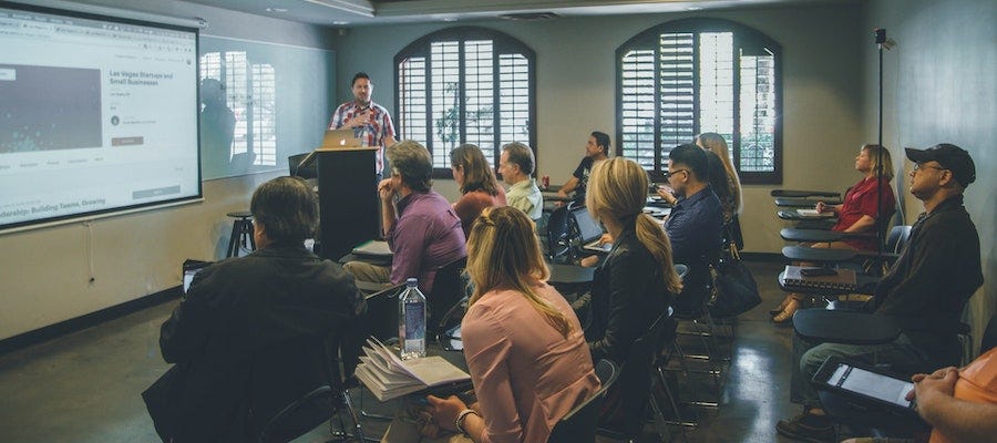 Man speaking to workshop attendees