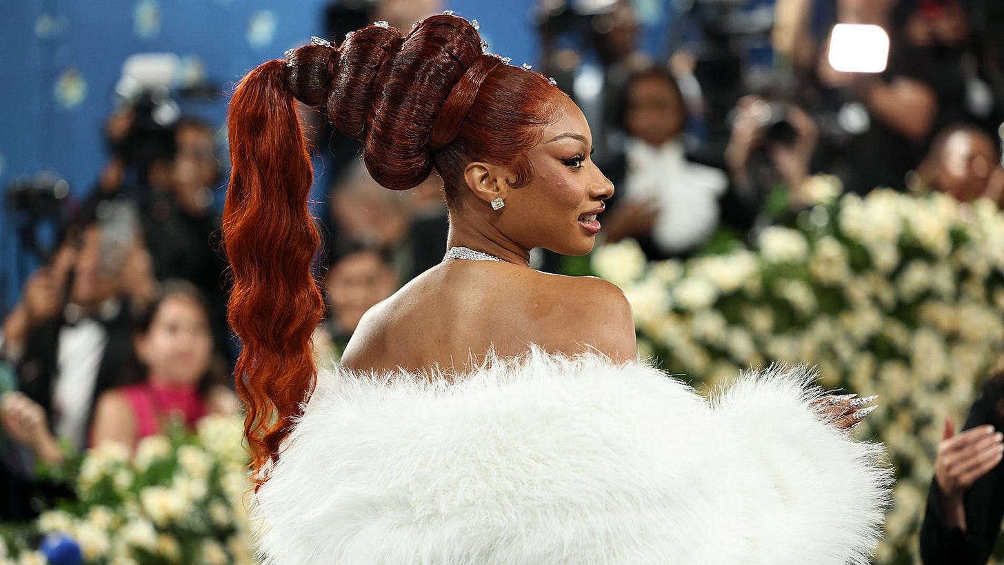 Megan Thee Stallion breaks Anna Wintour's no-phone rule at Met Gala