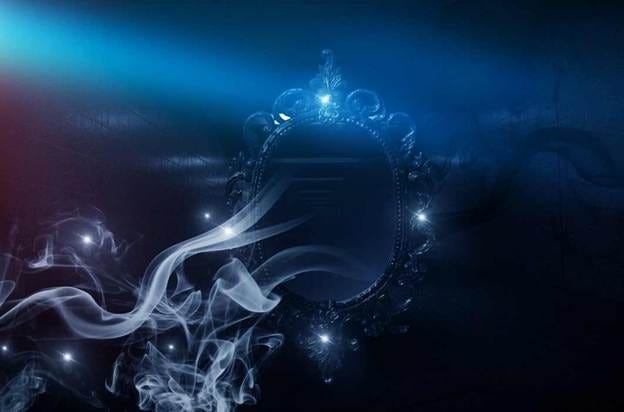 Mirror magic, fortune telling and fulfillment of desires. Fantasy with a mirror, dark room, magical power, night view. (MiaStendal /Adobe Stock)