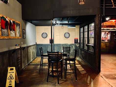 arcade, darts, chairs, tables