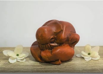weeping yogi statue