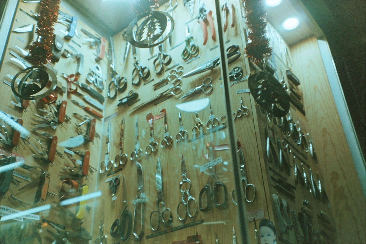 A display case full of tools and hardware.