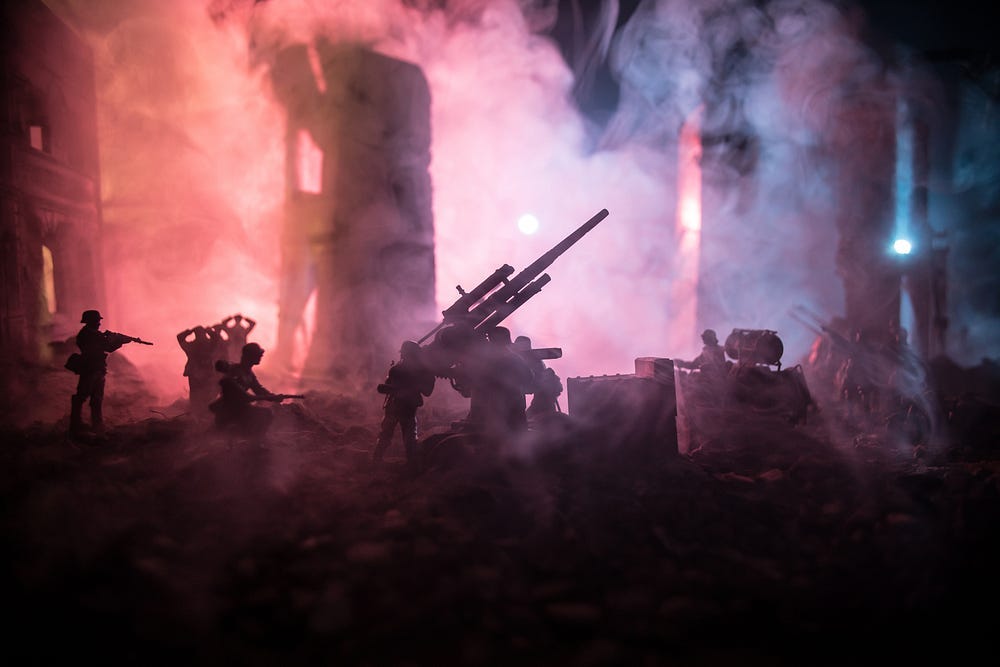 Image of a smoke-filled city, destroyed by war, with soldiers and weaponry visible in silhouette.