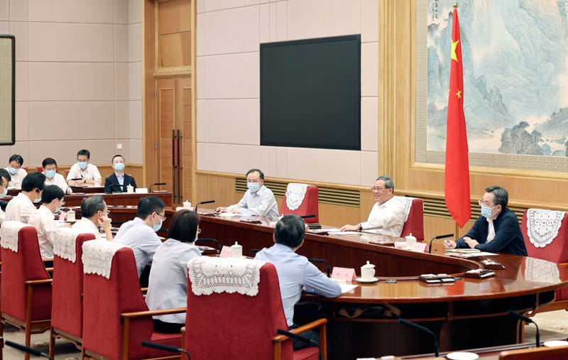 China's Premier just consulted these economists. What's their view on the economy?