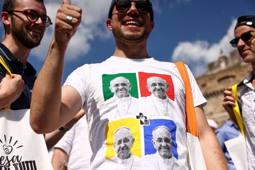 A member of the LGBTQ community wearing a T-shirt bearing Pope Francis' image in Rome on September 6, 2025.