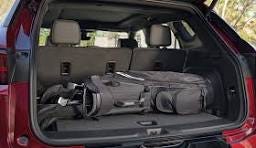 Back of SUV with golf clubs Back of SUV with golf clubs