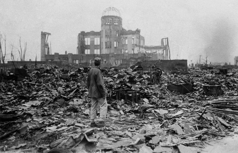 Image: A correspondent stands in the rubble in Hiroshima on Sept. 8, 1945, a month after the first atomic bomb ever used in warfare was dropped by the U.S. Image: A correspondent stands in the rubble in Hiroshima on Sept. 8, 1945, a month after the first atomic bomb ever used in warfare was dropped by the U.S.