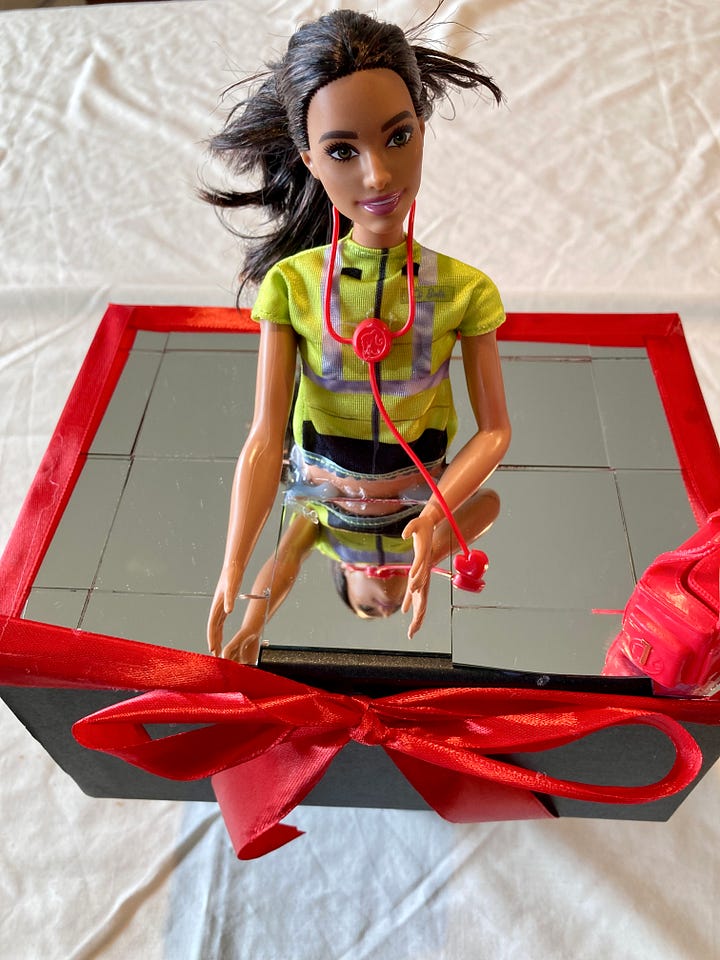 Images of paramedic doll on mirror