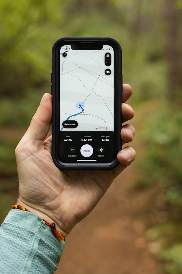 A handheld GPS device showing a route.