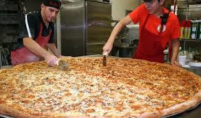 Meet and Eat the Biggest Pizza in Texas ...