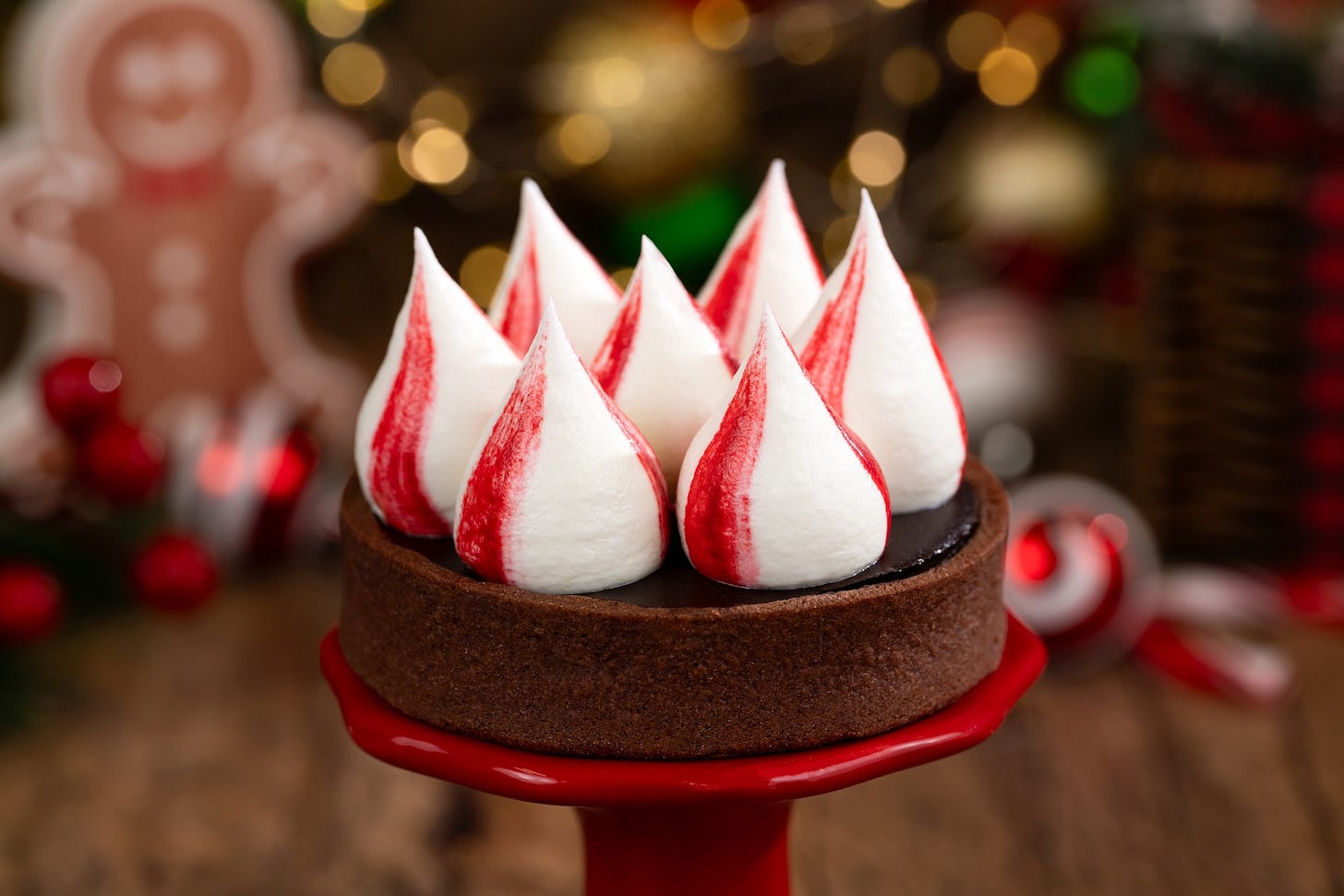 Candy Cane Tart: Chocolate tart filled with peppermint ganache and topped with festive meringue