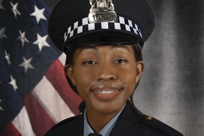Chicago police officer Aréanah Preston smiles in her official portrait for the Chicago Police Department.