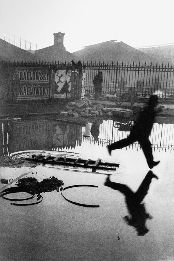 Place de l'Europe, Paris, 1932 (also known as "Behind The Gare St Lazare"). © The Decisive Moment by Henri Cartier-Bresson, published by Steidl www.steidl.de