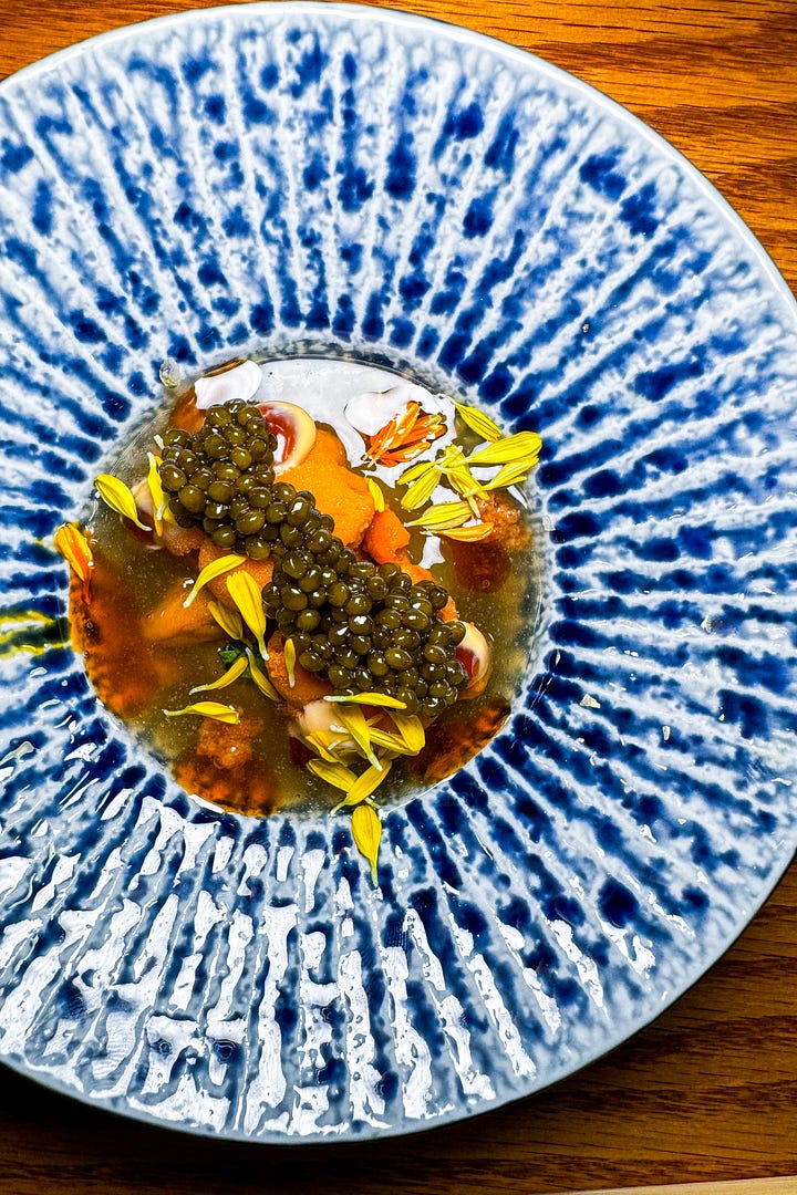 Chef Taka shaving summer truffles over shiromi white fish; uni with caviar and beef collagen and the beef stew in tomato sauce