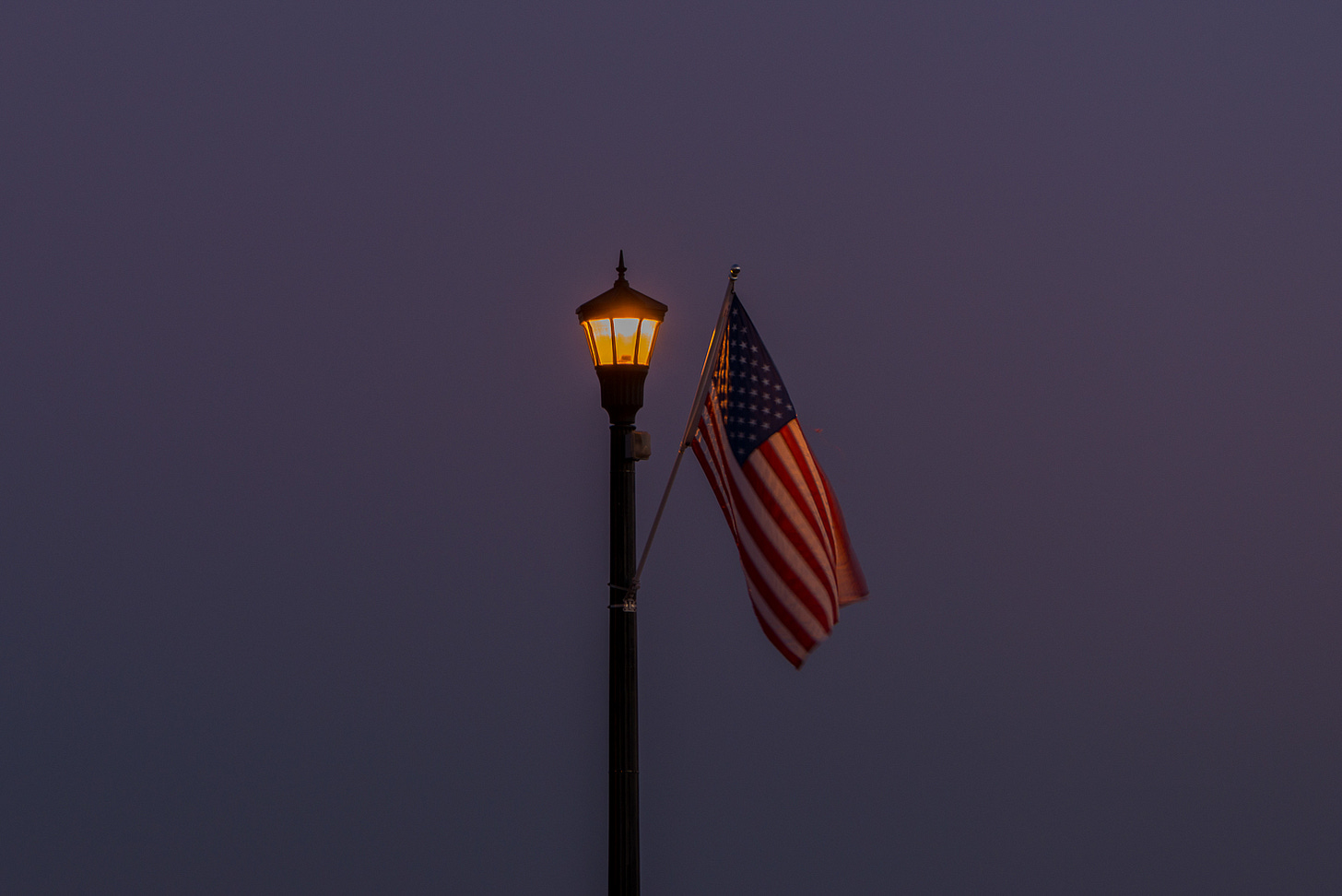 American flag on a light pole.