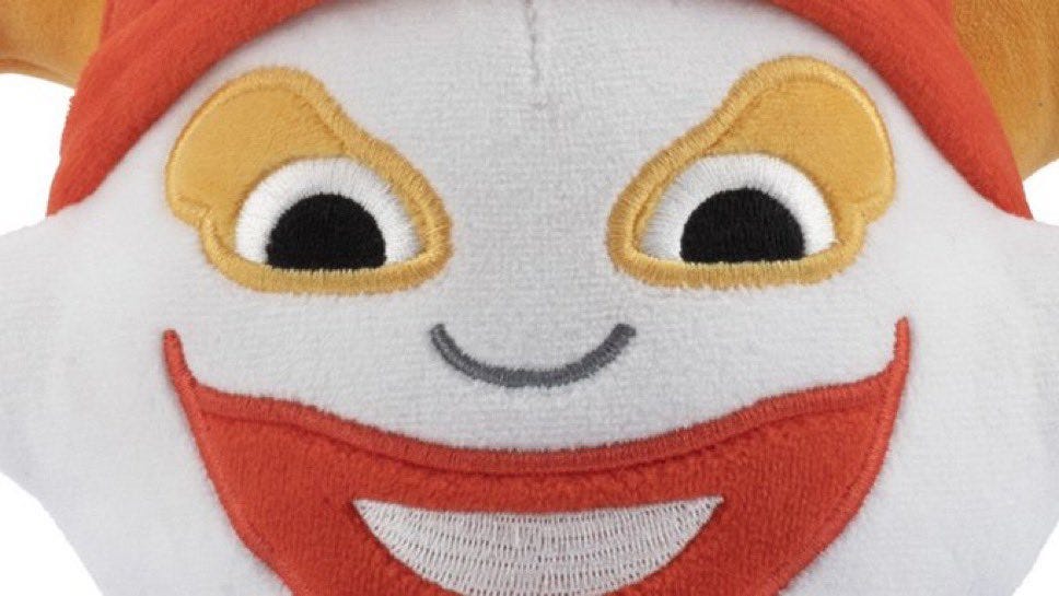 Zoom-in of a Balatro Joker plush toy.