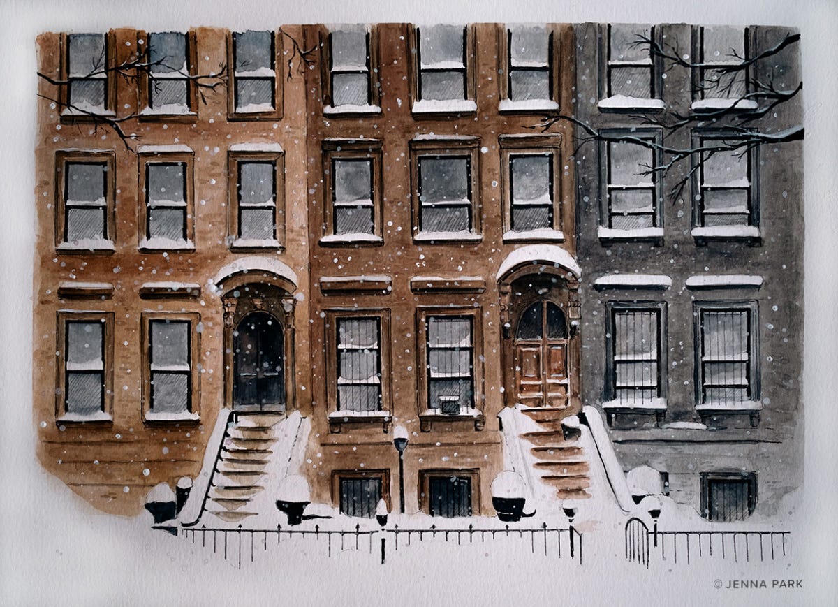 a snowy brownstone scene