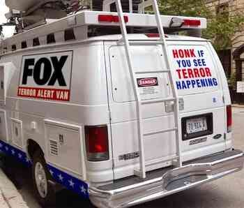 A Fox News van with a decal saying "Honk If You See News Happening"