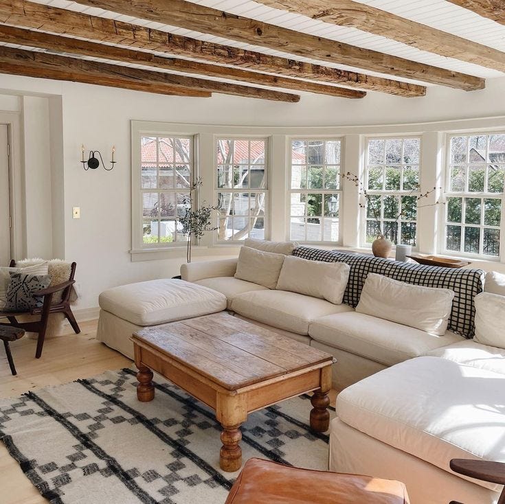 This may contain: the living room is clean and ready to be used as an office or family room