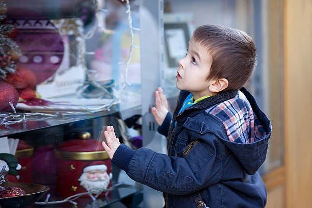 1,700+ Child Shop Window Stock Photos, Pictures & Royalty-Free Images ...