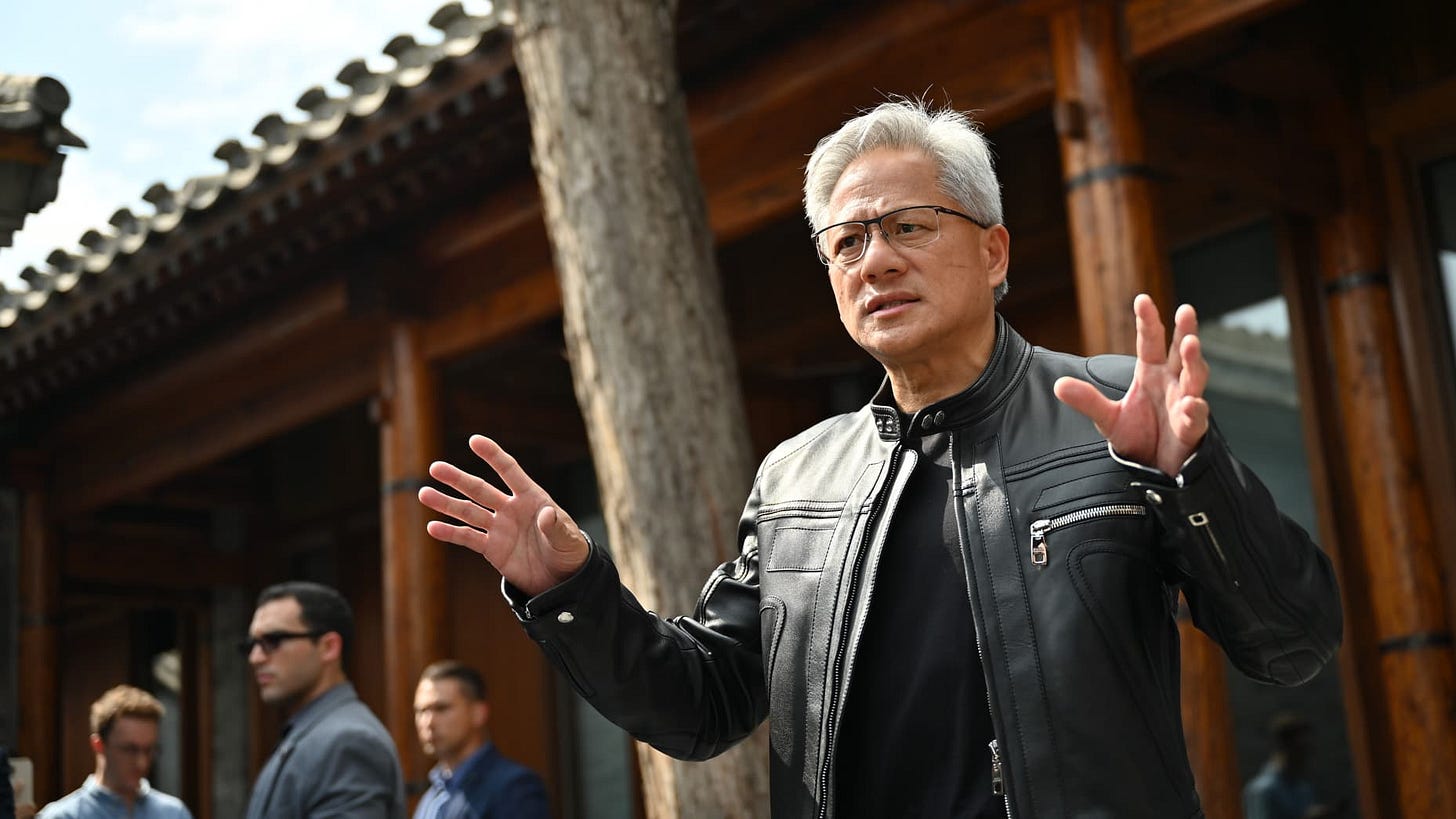 16 July 2025, China, Peking: Jensen Huang, CEO of Nvidia, speaks to journalists. During a trip to China, Huang gave a speech at the opening of the supply chain trade fair and met Chinese politicians. Photo: Johannes Neudecker/dpa (Photo by Johannes Neudecker/picture alliance via Getty Images)
