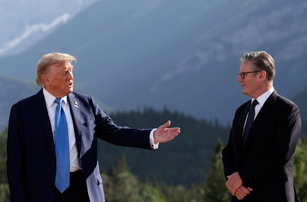 US President Donald Trump, left, and Britain's Prime Minister Keir Starmer attend a family photo session during the G7 Summit, in Kananaskis, Alberta, Monday, June 16, 2025 (AP) US President Donald Trump, left, and Britain's Prime Minister Keir Starmer attend a family photo session during the G7 Summit, in Kananaskis, Alberta, Monday, June 16, 2025 (AP)