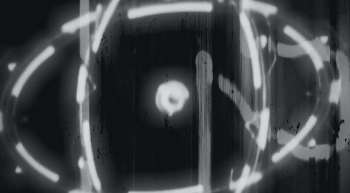 A round ring of bright white lines intersected vertically by a mirrored image of the white lines, with a bright orb in the center.