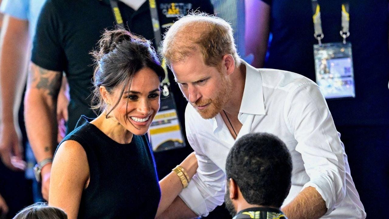 Photo of Prince Harry and Meghan Markle Photo of Prince Harry and Meghan Markle
