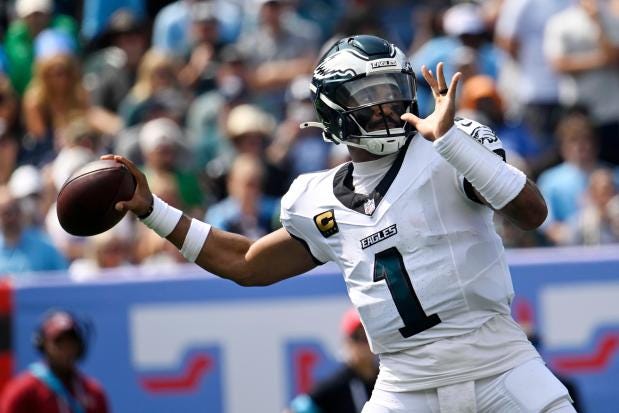 Philadelphia Eagles quarterback Jalen Hurts throws a pass during the first half against the Tennessee Titans on Sunday, Sept. 20, 2026, in Nashville. (AP Photo/John Amis)