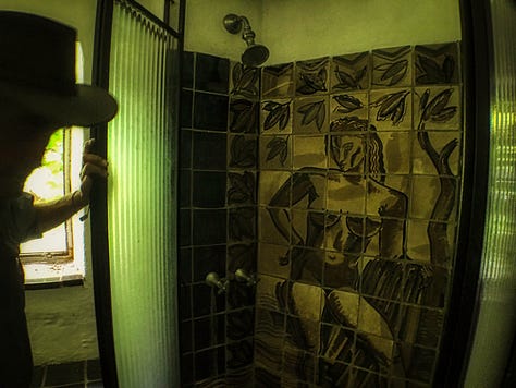 a ceramic toilet, sink, and shower