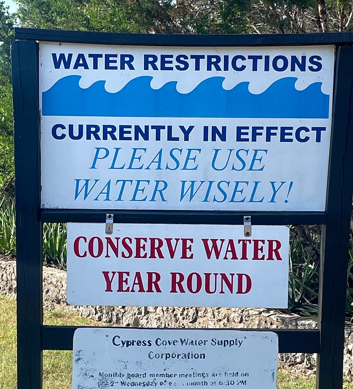 These are photos of the dry riverbed, the warning sign about diving, and the water conservation sign.