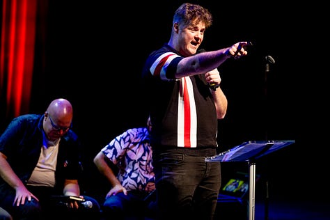 Photos of comedians on stage at the malthouse theatre peforming comedy.