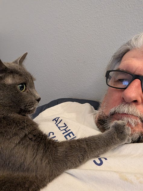 Greg Rowland with his cat Big Bit